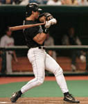 Jose checking his swing on 7/5/99 (AP)